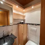De A
